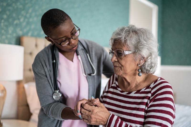 Older woman with caregiver
