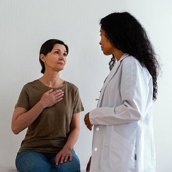 Female patient talking with a doctor